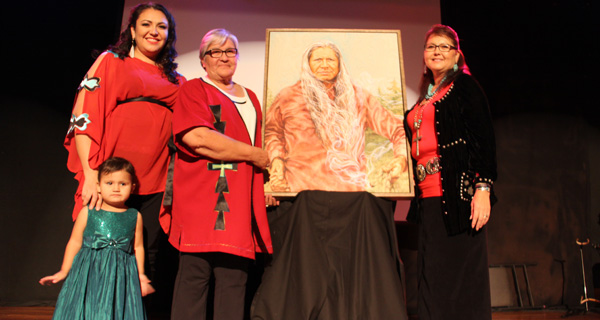 Gordon’s daughter Disa Tootoosis, his daughter’s granddaughter Ni’vy, his wife Irene Tootoosis and daughter Alanna Tootoosis-Baker unveiled the portrait commissioned to honour the late Gordon Tootoosis. 