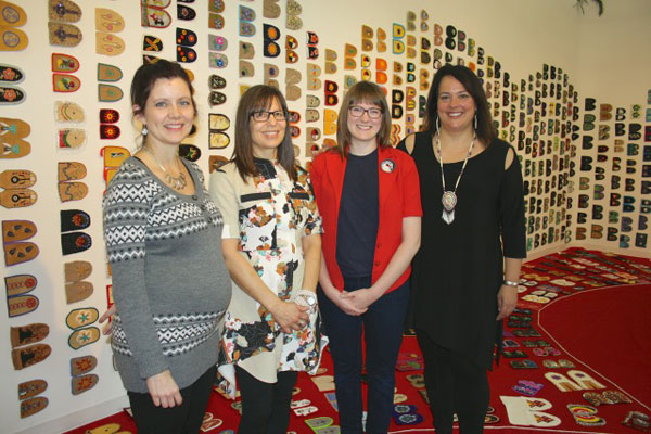Danette Exner, Judy Anderson, Katherine Boyer and Racelle Kooy. Kooy is the keeper of the exhibit while it is in Regina.